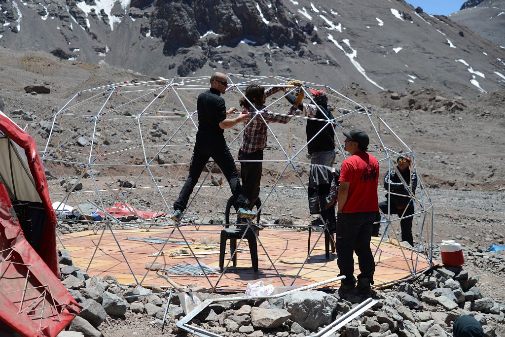 06 French Guide Olivier Riviere And Porters Nestor and Peluca Build A New Inka Expediciones Large Tent On a Rest Day At Aconcagua Plaza Argentina Base Camp 4200m